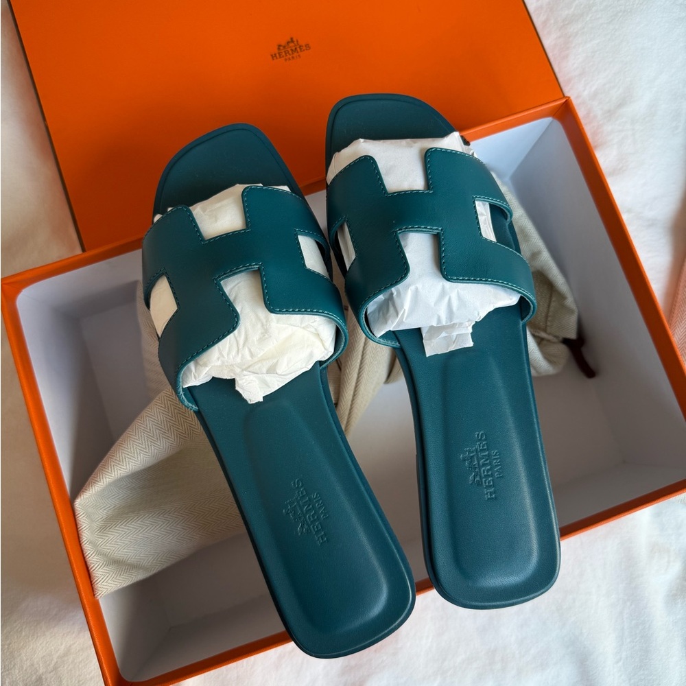 Hermès Oran Sandals in Blue Emeraude